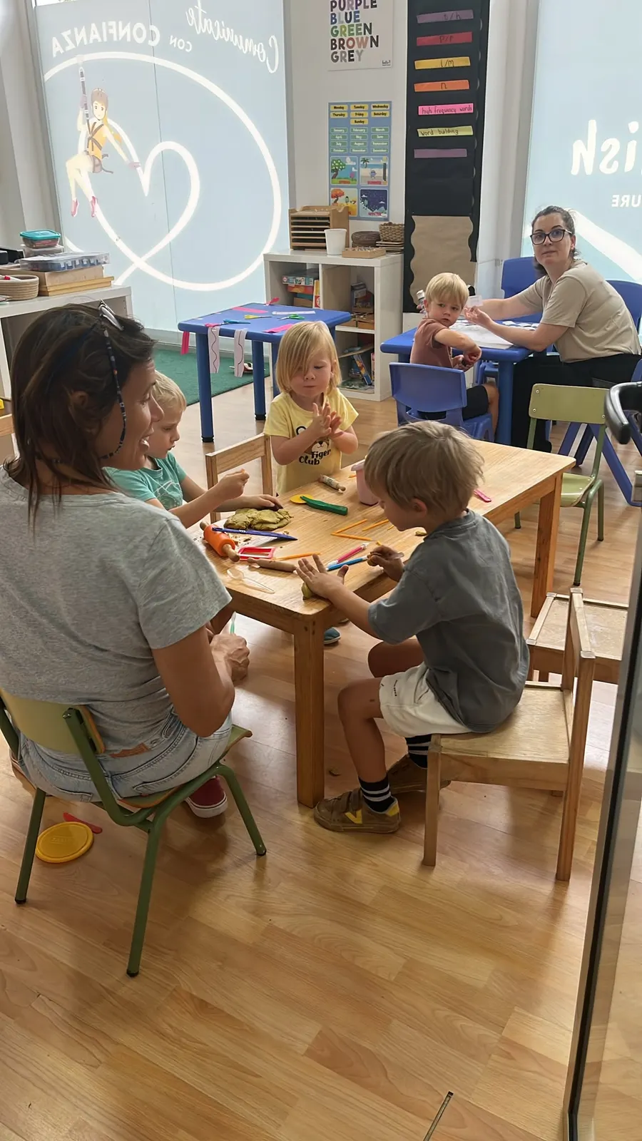 View into the Ella's English classroom through the heart-logo window